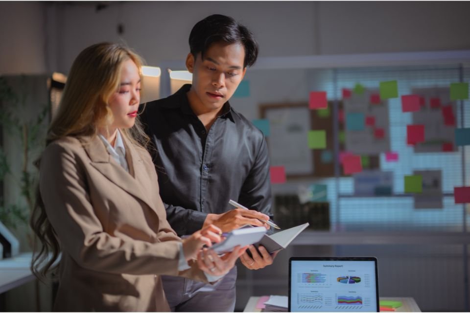 Asian businesspeople analyzing IP and Commercialization
